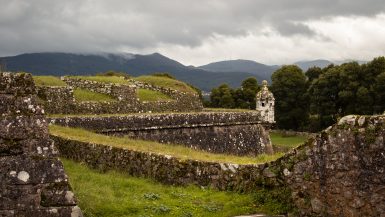 Scenic view of hidden gems in Northern Portugal, including medieval towns, stunning beaches, and unique landmarks like the Stone House in Fafe.