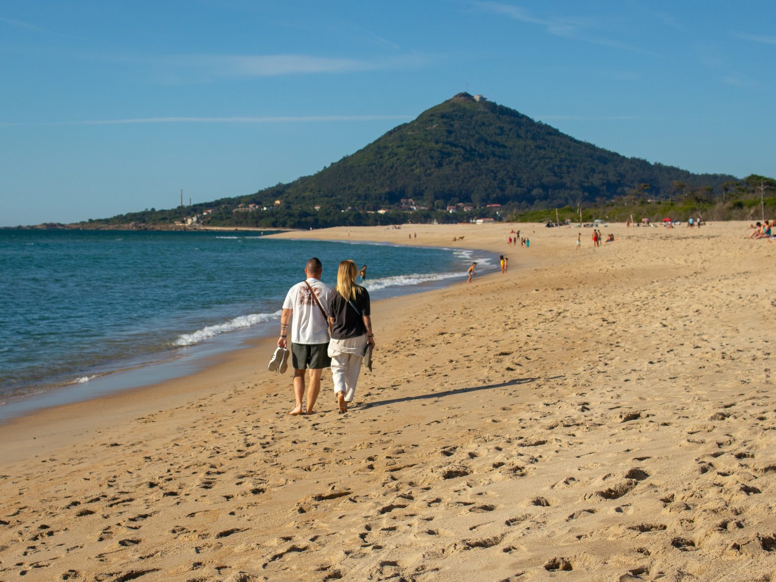 Moledo Beach in northern Portugal with a view of Forte da Ínsua, a 15th-century fortress located in the ocean