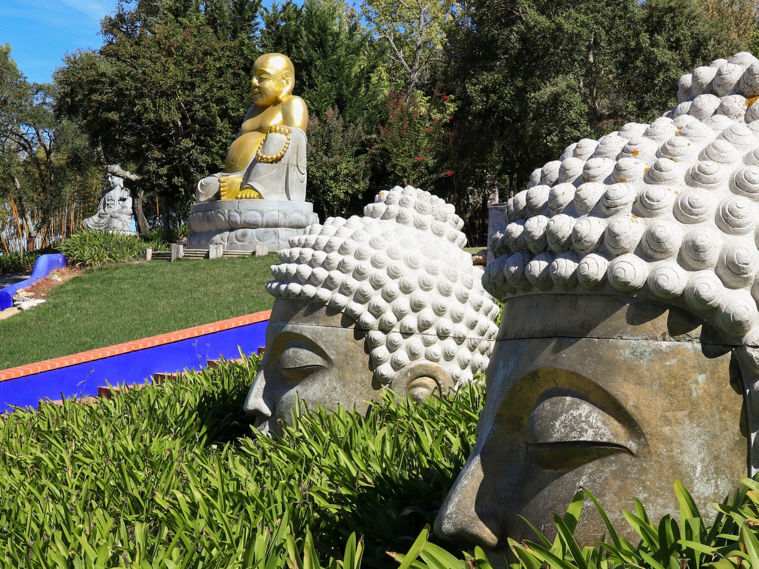 Massive golden Buddha at the heart of Buddha Eden Park