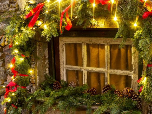 Thousands of LED lights illuminate the schist houses and decorated streets, creating a magical winter atmosphere in this mountain village
