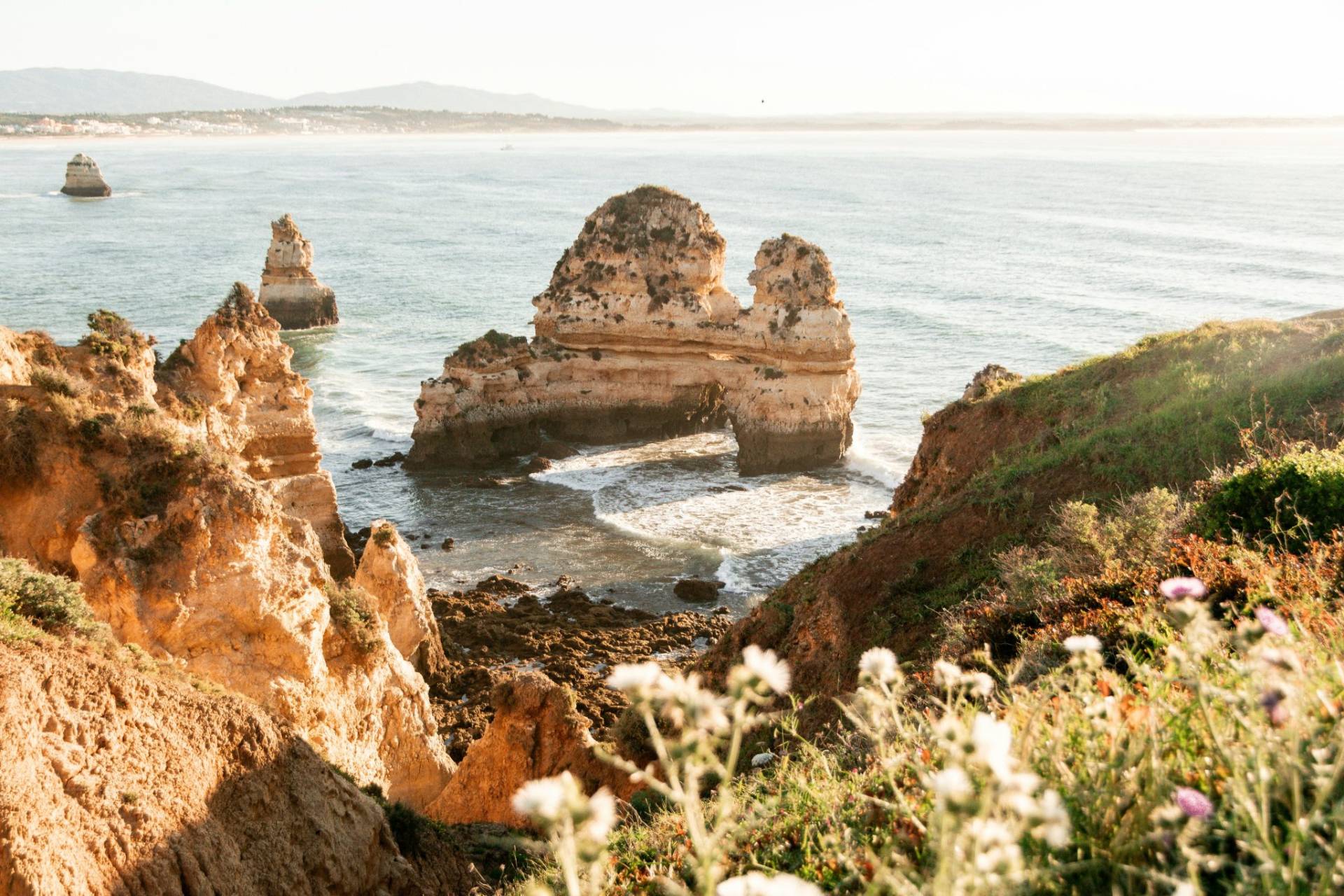 Explore Algarve to see golden sandy beaches, dramatic cliffs, charming fishing villages, the vibrant town of Lagos, the beautiful Ria Formosa lagoon, and some of the best golf courses in Europe